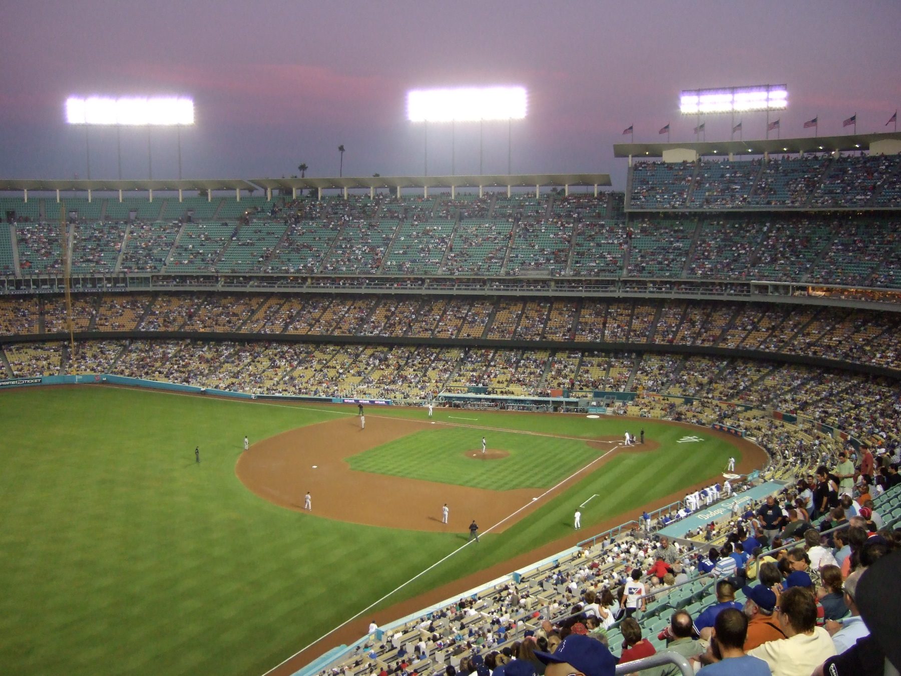 Four (4) Premium Dodgers Tickets — Row D Behind Home Plate + Preferred Parking